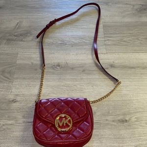 Small red Michale Kors crossbody